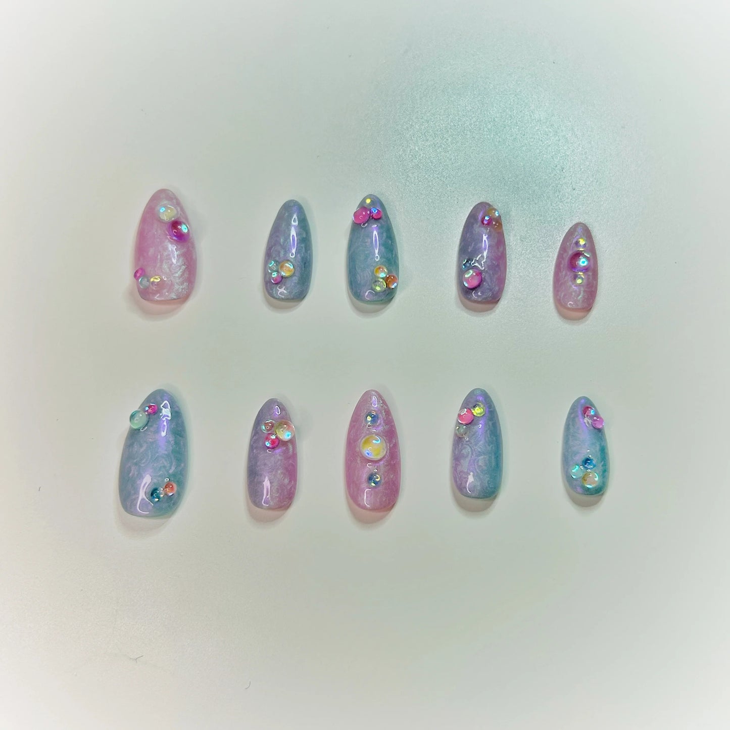 set of 10 press on nails shimmery purple and pink polish and 3D bubble charms
